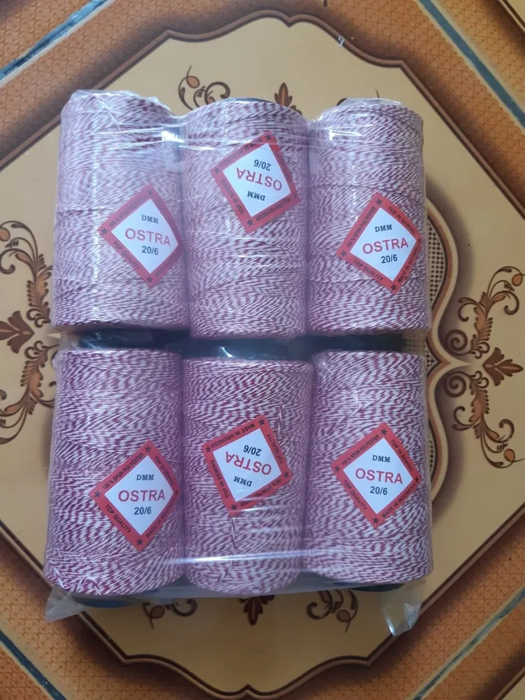 Kemasan isi enam cone benang OSTRA DMM 20/6 warna mambo merah-putih